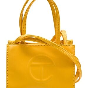 Telfar Yellow Mini Bag with Embossed Logo and Versatile Strap
